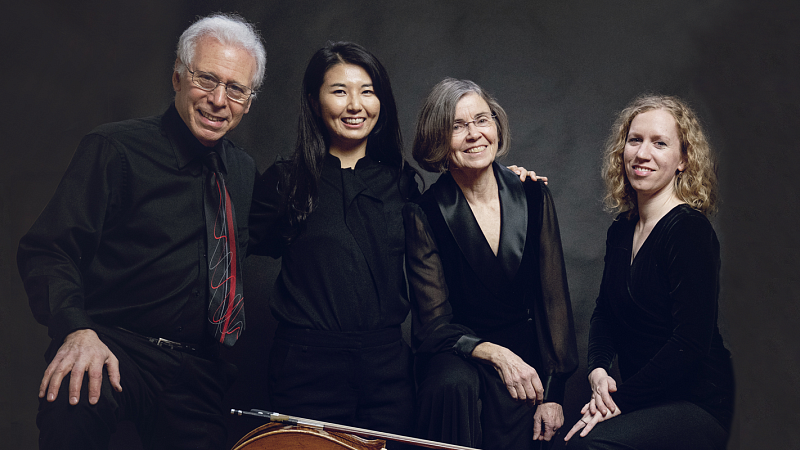 The four musicians of Chamber Music Amici in formal attire