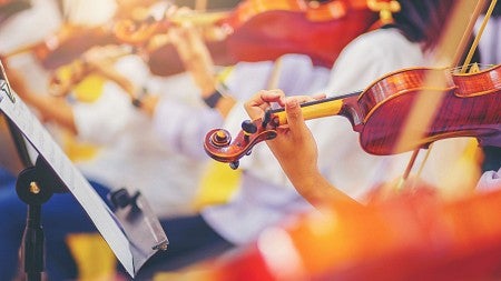 close up of violin being rehearsed