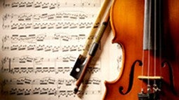 Violin and sheet music Violin and sheet music